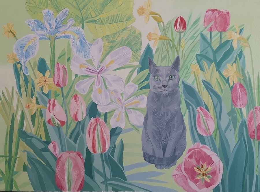 Jardin de lirios, tulipanes y gato